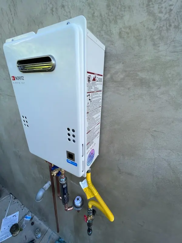 Tankless water heater installation for H and H Corner homes